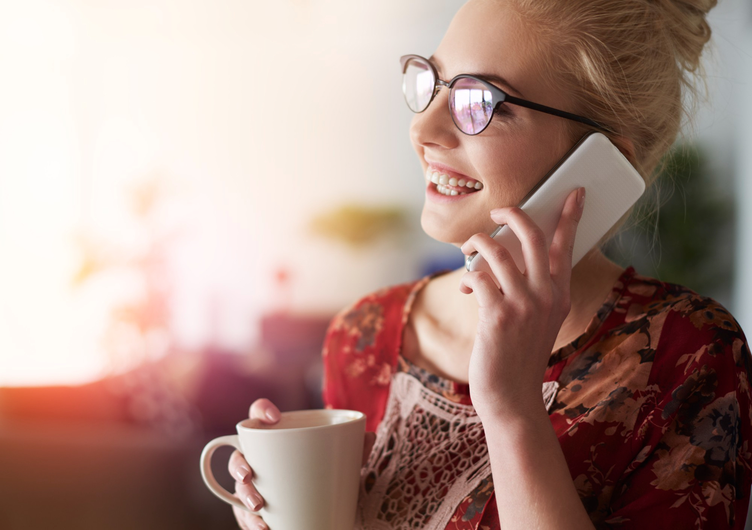 Happy customers on a phone call