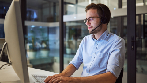 Property manager handling an out-of-hours tenant maintenance call remotely